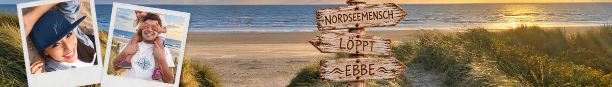 Strand mit Wegweiser